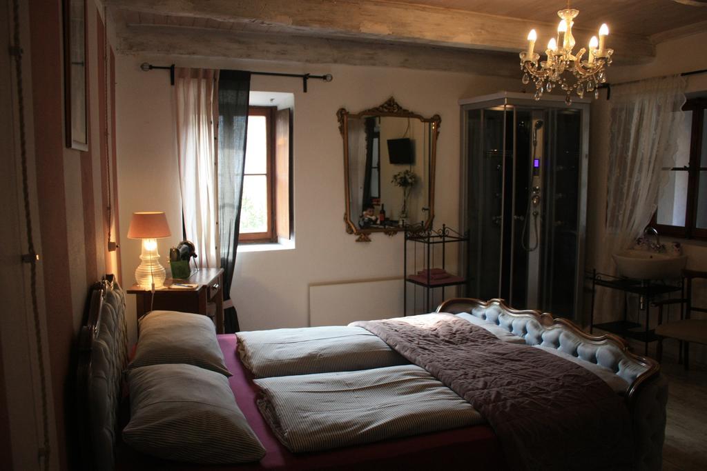 Affittacamere Casa Archi Losone Pokoj fotografie